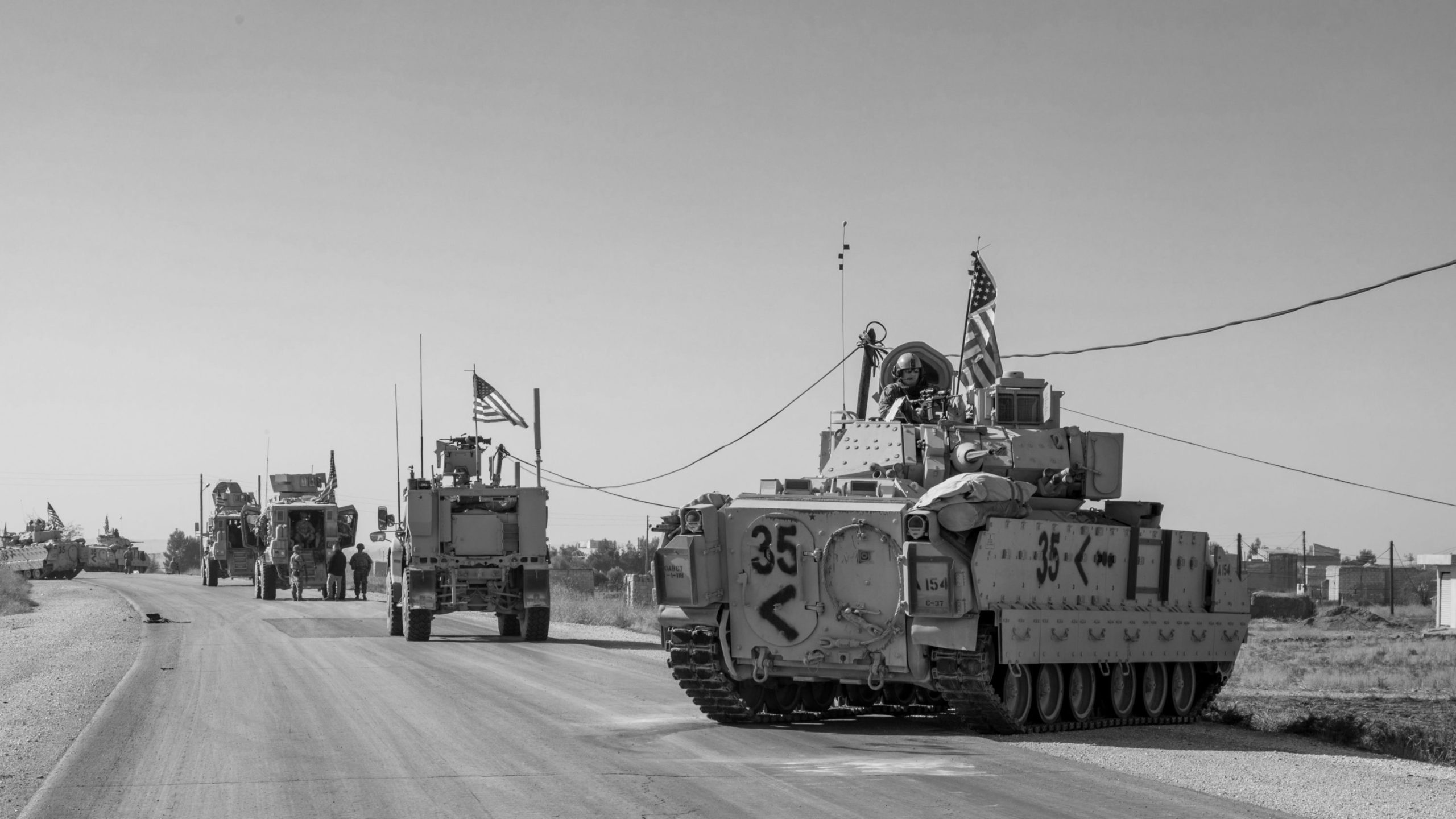 U.S. Soldiers in the 4th Battalion, 118th Infantry Regiment, 30th Armored Brigade Combat Team, North Carolina Army National Guard, attached to the 218th Maneuver Enhancement Brigade, South Carolina Army National Guard, provide M2A2 Bradley Fighting Vehicles for support to Combined Joint Task Force-Operation Inherent Resolve (CJTF-OIR) eastern Syria Nov. 10, 2019.  The mechanized infantry troops partner with Syrian Democratic Forces to defeat ISIS remnants and protect critical infrastructure in eastern Syria. (U.S. Army Reserve photo by Spc. DeAndre Pierce)