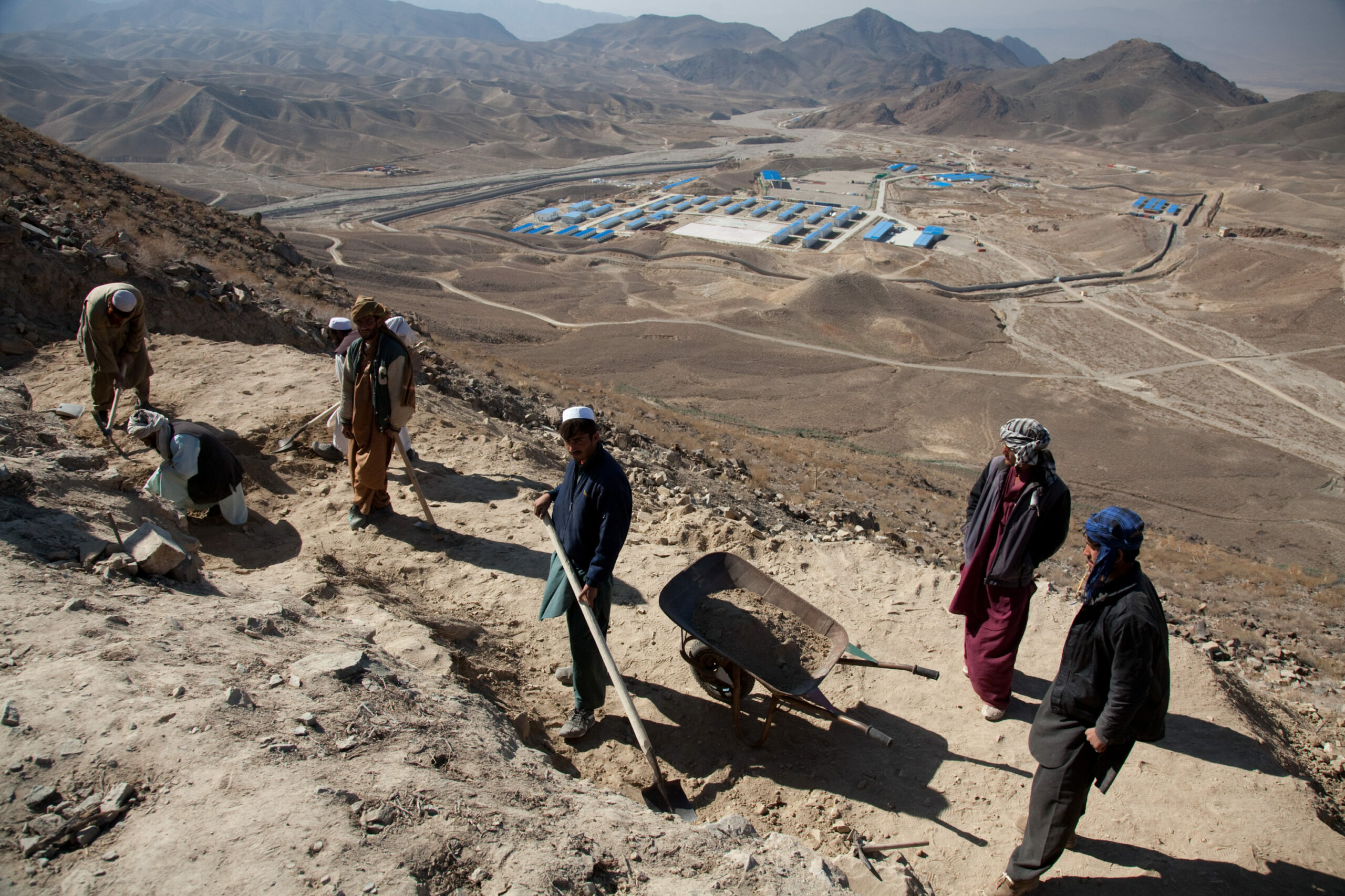 The Chinese state owned mining company MCC have built a camp at Mes Ainak, 35km south of Kabul, while archeologists are racing to excavate a series of ancient Buddhist monasteries before the bulldozers roll in. The Afghan government is desperate for the copper royalites, once mining starts, but officials familiar with the deal said the Chinise, having secured the rights to the deposit, appear to be in no hurry to start exploiting it. They are supposed to build a railway and a power station, but have not started either.