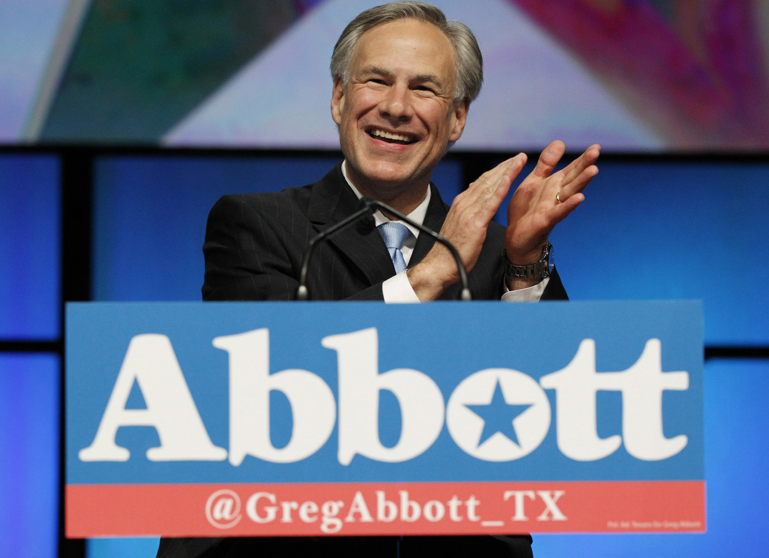 Texas Attorney General Greg Abbott applauds the delegates during the opening session of the Texas state Republican convention at the FWCC on Thursday June 7, 2012 in Fort Worth, Texas. (Ron T. Ennis/Fort Worth Star-Telegram/MCT via Getty Images)