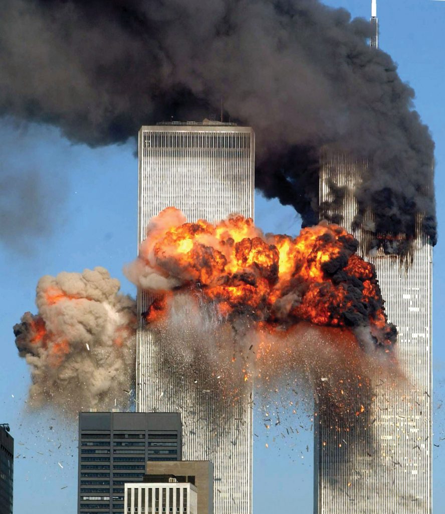 Smoke-flames-twin-towers-attacks-World-Trade-September-11-2001-888x1024