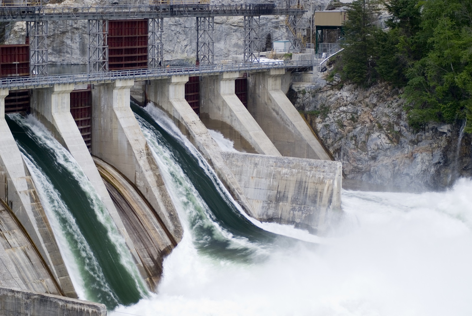 water flowing through a hydro electric generation plant