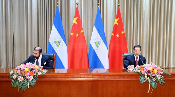 (211210) -- TIANJIN, Dec. 10, 2021 (Xinhua) -- China and Nicaragua sign the joint communique on the resumption of diplomatic relations between the People's Republic of China and the Republic of Nicaragua in north China's Tianjin, Dec. 10, 2021. (Xinhua/Yue Yuewei) (Photo by Yue Yuewei / XINHUA / Xinhua via AFP)