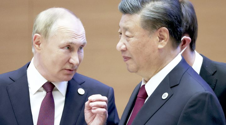 FILE - Russian President Vladimir Putin, left, gestures while speaking to Chinese President Xi Jinping during the Shanghai Cooperation Organization (SCO) summit in Samarkand, Uzbekistan, Sept. 16, 2022. China said Friday, March 17, 2023, President Xi will visit Russia from Monday, March 20, to Wednesday, March 22, 2023, in an apparent show of support for Russian President Putin amid sharpening east-west tensions over the conflict in Ukraine. (Sergei Bobylev, Sputnik, Kremlin Pool Photo via AP, File)